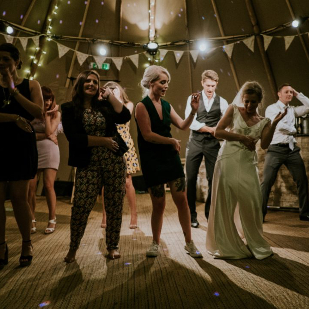 The Ultimate Upbeat Wedding Entrance Songs To Kick Off Your Reception